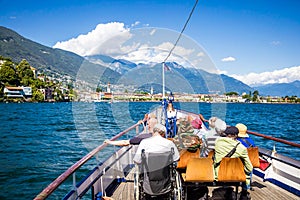 Ascona, Switzerland Ã¢â¬â JUNE 24, 2015: Passengers enjoy the scenery of the Lake Maggiore